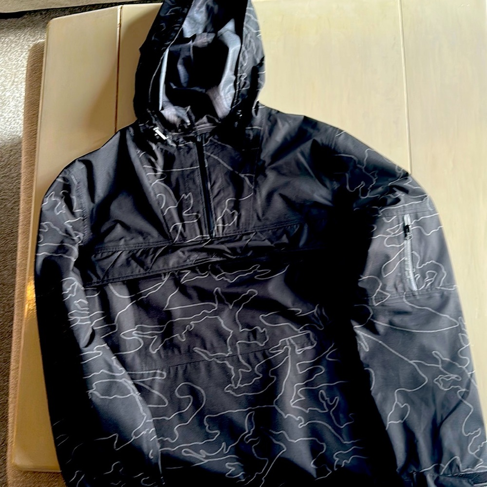 Rain jacket- wore it once - kinda new